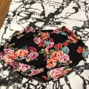 Floral shorts.